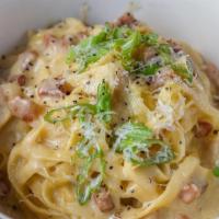 Spaghetti Pomodoro · DOP San Marzano, fresh basil, extra virgin.
