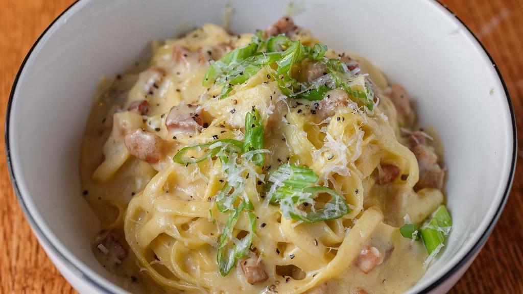 Spaghetti Pomodoro · DOP San Marzano, fresh basil, extra virgin.