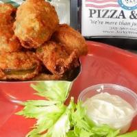 Jalapeño Poppers · 6 jalapeno cream cheese poppers served with a side of homemade ranch.