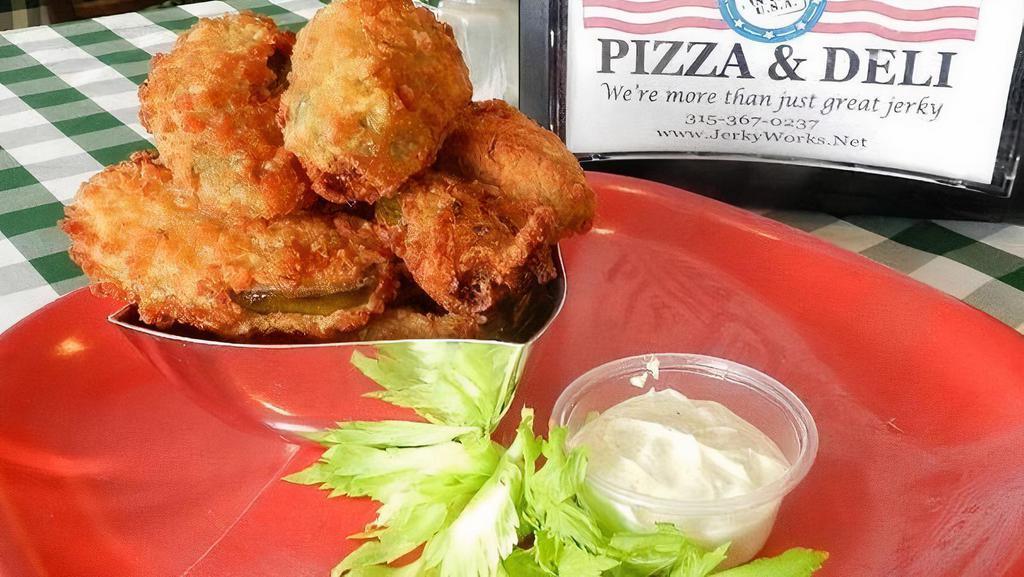 Jalapeño Poppers · 6 jalapeno cream cheese poppers served with a side of homemade ranch.