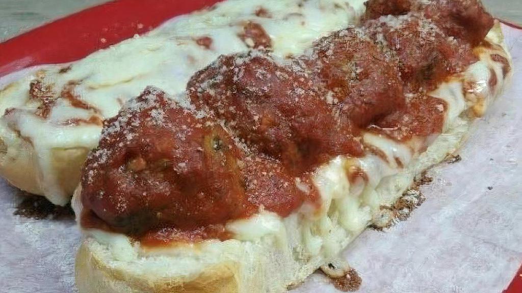 Meatball Sub · Our homemade meatballs served on an 8