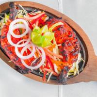 Kodi Tandoori (Chicken Tandoori - Full) · Chicken Legs And Thigh Pieces Are Marinated Overnight In Yogurt With Herbs And Spices And Co...
