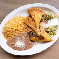 Maggie'S Quesadillas · Mushrooms, chicken, steak, spicy pork or tinga on flour tortilla with Oaxaca cheese lettuce,...