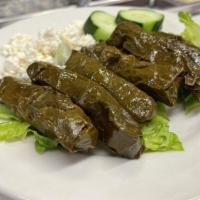 Grape Leaves · Vegetarian. Grape leaves (5) stuffed with rice, tomatoes, parsley, onions.