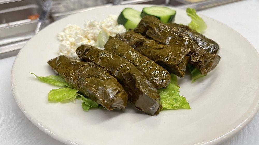 Grape Leaves · Vegetarian. Grape leaves (5) stuffed with rice, tomatoes, parsley, onions.