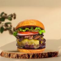 Must Be Mushroom Vegan Burger · Plant-based beyond meat patty grilled and topped with mushrooms, melted vegan mozzarella che...