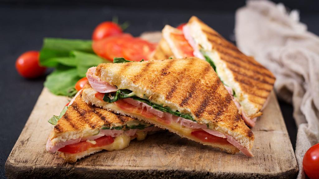 Grilled Cheese & Tomato Breakfast Sandwich · Delicious Grilled Breakfast sandwich containing melted cheese and sliced tomato. Served on customer's choice of bread.