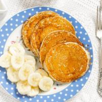Buttermilk Pancakes With Banana Slices · 3 pieces of freshly prepared Pancakes. Topped with fresh banana slices.