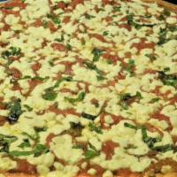 Nonna Pizza · Grandma pie with fresh mozzarella, tomato, basil on thin crust cooked in pan.