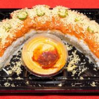 Ninja Roll · Tempura crab stick and cream cheese inside, eel. smoked salmon and avocado on top.