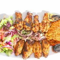 Grilled Chicken Wings · Turkish style char-grilled chicken wings served with mixed greens and bulgur.