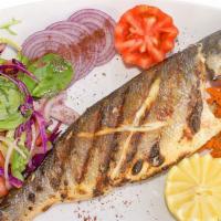Bronzini · Whole Mediterranean sea bass char-grilled served with house mixed greens and a side dish.