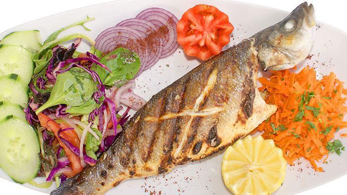 Bronzini · Whole Mediterranean sea bass char-grilled served with house mixed greens and a side dish.