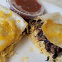 Huevos Wrap · Tortilla wrapped with Black Bean with cheese and fluffy Egg