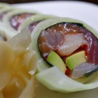 Rainbow Naruto · Five pieces of raw fish, avocado & tobiko, wrapped with thin-sliced cucumber, glazed with ch...