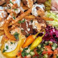 Kafta Kabab Bowl · Choice of two sides and sauces with pita on the side.
(Sauce comes on Bowl unless you ask fo...