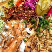 Hummus Bowl · Choice of two sides and sauces with pita on the side.
(Sauce comes on Bowl unless you ask fo...