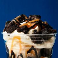 Ice Cream Sundae · Two scoops of ice cream; choice of brownies or broken cones; choice of chocolate, caramel or...