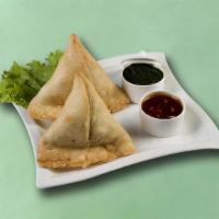 Village Veg Samosa · Filo pastry filled with gently spiced potato mash, peas, and dry spice mix deep-fried till g...