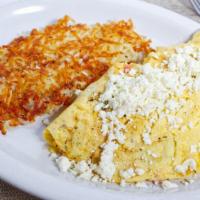 Greek Omelette · With onion, tomato and feta cheese. Served with home fries and buttered toast.