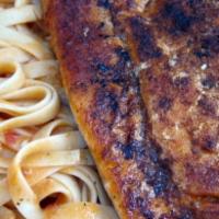 Salmon Pasta Special · Sauteed with fresh broiled filet of salmon with vodka sauce. Served with salad and bread.