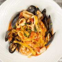 Fruti Di Mare · Fettucine, mussels, squid, shrimp, and  cherry tomatoes