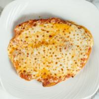 Chicken Parmigiana · Breaded organic chicken breast, tomato, fresh mozzarella, with side of pasta