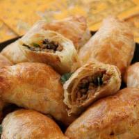 Basil Puff · Pasty puff filled with chicken basil served with sweet ajard sauce
