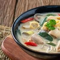 Tom Kha Chicken · Creamy coconut soup with galangal,mushroom,cilantro. 
Indicates hot&spicy dishcanbemodifiedt...