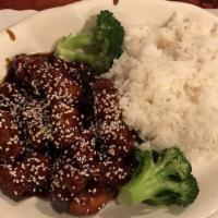 Sesame Chicken · Chunks of chicken meat with chef's special sauce, topped with sesame seeds. Steamed broccoli...