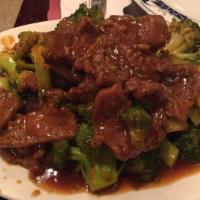 Beef With Broccoli · Sautéed slices tenderness beef with broccoli in brown  sauce. 
Served with white or yellow r...