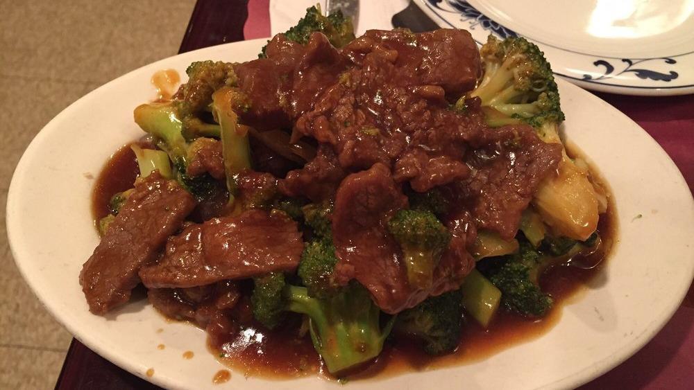 Beef With Broccoli · Sautéed slices tenderness beef with broccoli in brown  sauce. 
Served with white or yellow rice.