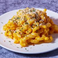 Truffle Mac ＆ Cheese · Macaroni prepared with freshly made cheese sauce, beurre noisette, bread crumbs and white tr...