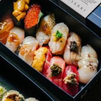 Omakase Juuni · 12 pieces of chef's choice nigiri and your choice of 5 piece futomaki. Includes Uni and Toro...