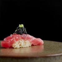 Akami Nigiri · Lean Bluefin tuna. Served with chef's choice of toppings.