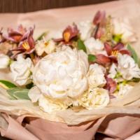 Blush Garden · Beautiful blush arrangement with ranunculus, peonies, anemone, garden roses, and hellebore a...