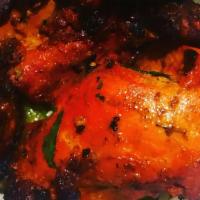 Chicken Tandoori · Chicken served on the bone. Clay oven cooked.