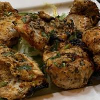 Chicken Malai Kebab · Cubes of chicken breast marinated in yogurt and cream cheese, flavored with fresh coriander ...