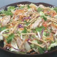 Oriental Chicken Salad · Chilled Iceberg Lettuce, Red Cabbage, Carrot, Bean Sprouts, Chinese Parsley and Crunchy Frie...