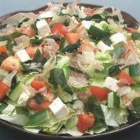 Tofu Salad · Crisp Iceberg Lettuce, Tomatoes, Cucumber, Bonito Flakes and Diced Tofu Tossed with Our Orig...