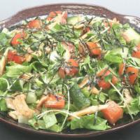 Salmon Skin Salad · Tender Leaf Lettuce, Tomatoes, Cucumber, Julienne Daikon, Bonito Flakes and Daikon Sprouts T...