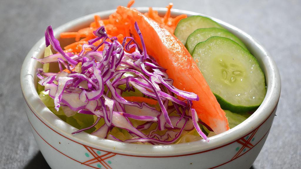 Mini Salad · Chilled iceberg lettuce, red cabbage, carrot, cucumber & imitation crab tossed with our original Wafu Dressing.
