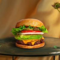 Turn Up The Avo Burger  · Seasoned Beyond meat patty topped with avocado, melted vegan cheese, lettuce, tomato, onion,...