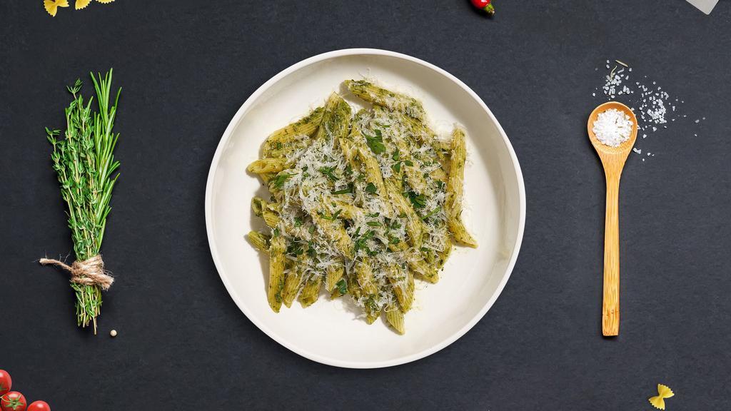 Manipesto Pasta · Fresh basil leaves, garlic, grated parmesan cooked with penne. Served with garlic bread.