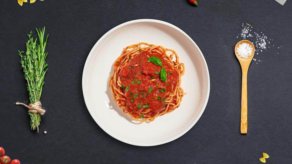 Marinara Madness · Fresh tomatoes, olive oil, and basil ground for marinara sauce cooked with spaghetti. Served with garlic bread.