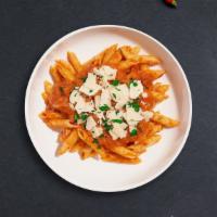 The Tipsy Pasta · Creamy tomato and white sauce blend cooked with penne. Served with garlic bread.