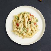 Prime Primavera Pasta · Sauteed seasonal vegetables and tomatoes in a light tomato sauce in a bed of penne. Served w...