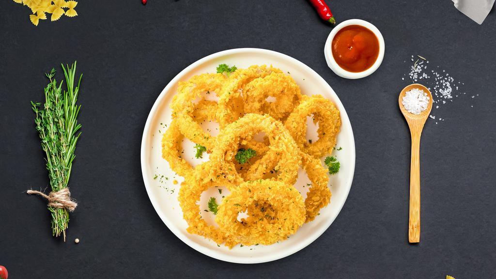 Golden O'Rings · Freshly cut onions lightly battered and fried until golden crisp. Served with marinara sauce.
