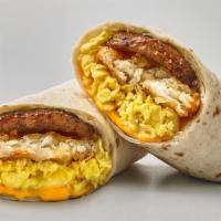 Sausage Egg & Cheese Burrito · Two scrambled eggs, sausage, hash brown and cheese on white tortilla wrap