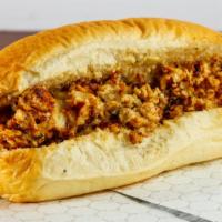 Chicken Cheesesteak · Shredded chicken breast, onion, green pepper and cheese on a 12